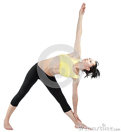 Young woman doing yoga exercise Stock Photo