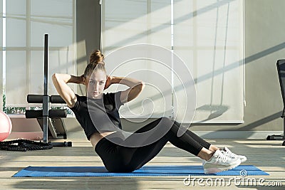 A young woman doing yoga. Sporty woman practicing yoga Stock Photo