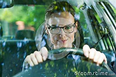 Young woman driving a car Stock Photo