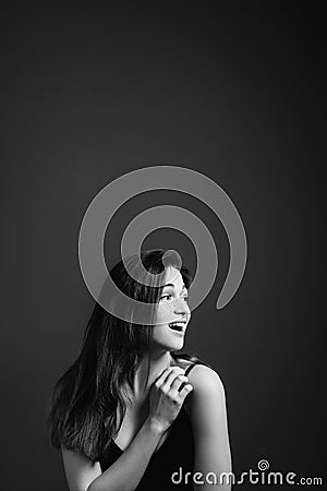 Young woman emotion surprise elation open mouth Stock Photo