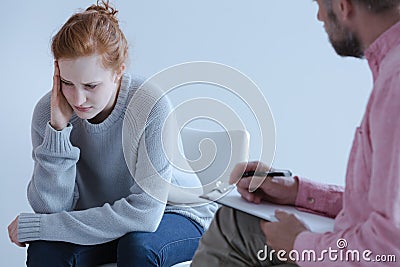 Young woman with emotional problems thinking about the future an Stock Photo