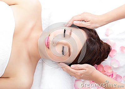 Young woman enjoy massage at spa Stock Photo