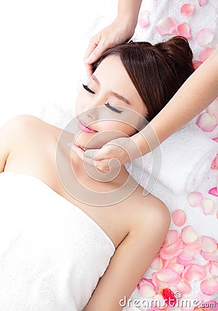Young woman enjoy massage at spa Stock Photo