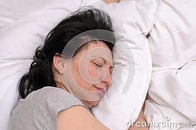 Young woman enjoying a good restful sleep Stock Photo