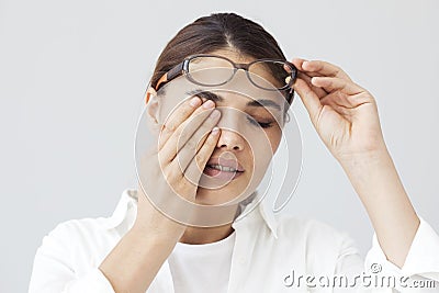 Young woman with eye fatigue Stock Photo