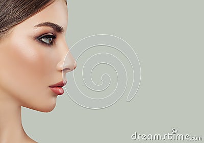 Young woman face, female profile on background Stock Photo