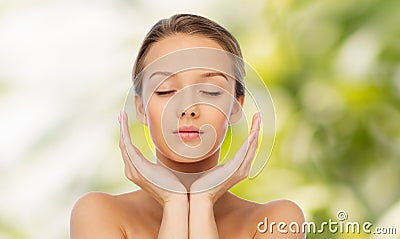 Young woman face and hands Stock Photo