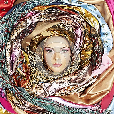 Young woman face with scarves Stock Photo