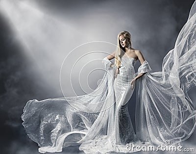 Young Woman in Fashion Shiny Dress, Lady in Flying Clothes, Girl under Star Light Stock Photo