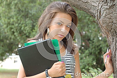 Young woman with folders Stock Photo