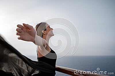Portrait of a beautiful young tourist in a cruise trip in the Mediterranean sea Stock Photo