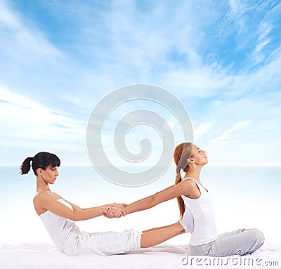 A young woman getting a traditional Thai massage Stock Photo