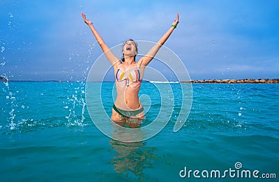 Young woman girl bath in the Ibiza beach Stock Photo