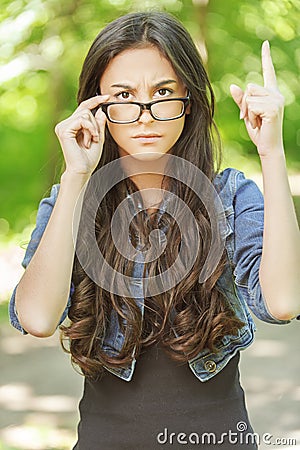 Young woman glasses frown Stock Photo