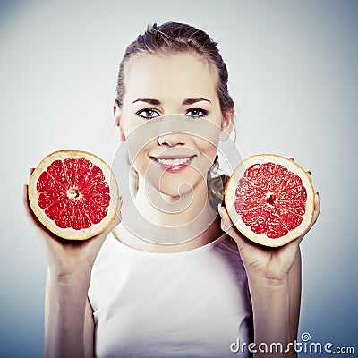 Young woman with grapefruit Stock Photo