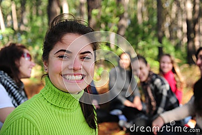 Young woman with a group of friends Stock Photo