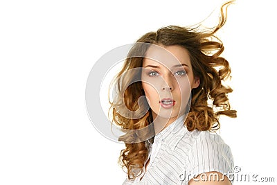 Young woman with hair flying under Stock Photo