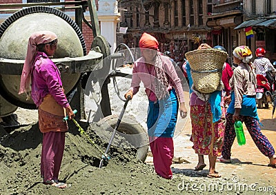 Young woman hard work at the construction in Nepal Editorial Stock Photo