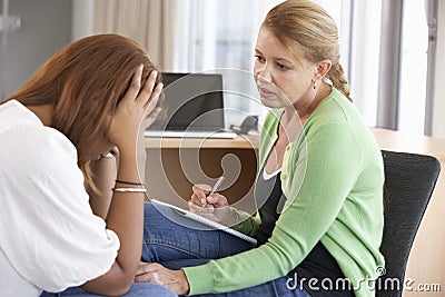 Young Woman Having Counselling Session Stock Photo