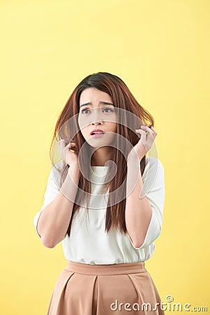 Young woman having hair problems Stock Photo