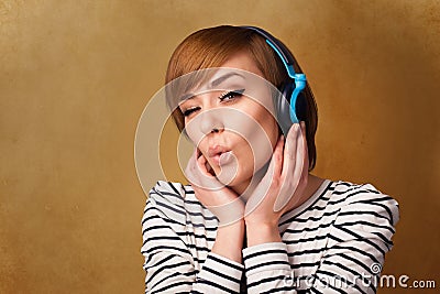 Young woman with headphones listening to music with copy space Stock Photo