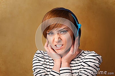 Young woman with headphones listening to music with copy space Stock Photo