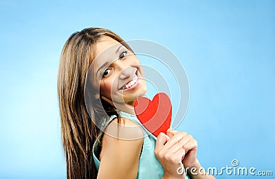 Young woman with heart symbol Stock Photo