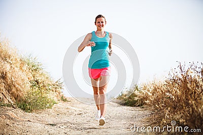 Young woman on her evening jog Stock Photo