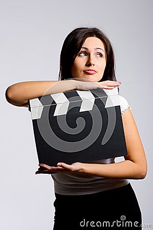 Young woman holding a clapper Stock Photo