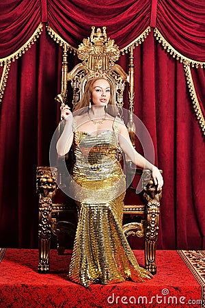 Young woman holding crown. Queen Stock Photo