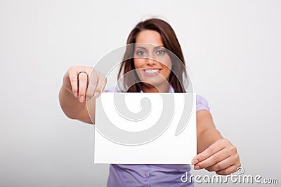 A young woman, holding an empty paper Stock Photo