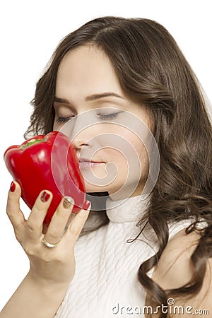 Young woman holding fruit in her hands and smiling,close-up Stock Photo