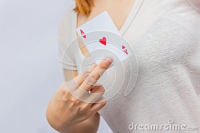 Young woman holding in hand poker card with combination of Full Stock Photo