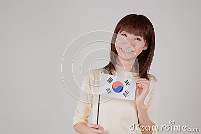 Young woman holding Korean flag Stock Photo
