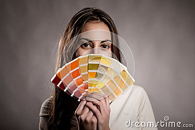 Young woman holding a pantone palette Stock Photo