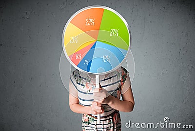 Young woman holding a pie chart Stock Photo