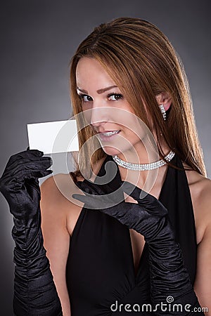 Young Woman Holding Visiting Card Stock Photo