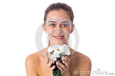 Young woman holding white flowers Stock Photo