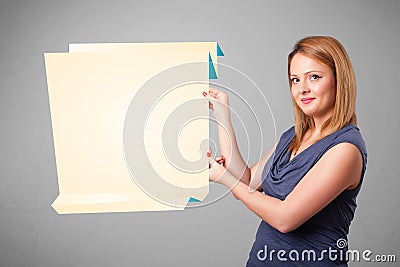 Young woman holding white origami paper copy space Stock Photo