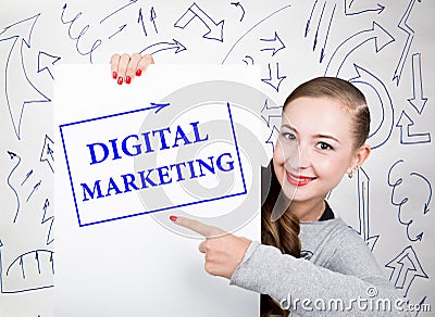 Young woman holding whiteboard with writing word: digital marketing. Technology, internet, business and marketing. Stock Photo