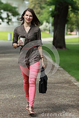 Young Woman in a Hurry Stock Photo