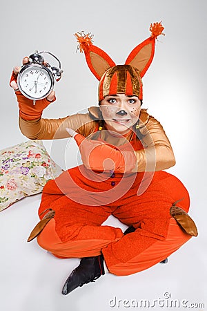 Young woman in the image of red squirrel Stock Photo