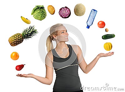 Young Woman Juggling Fruits and Vegetables Stock Photo