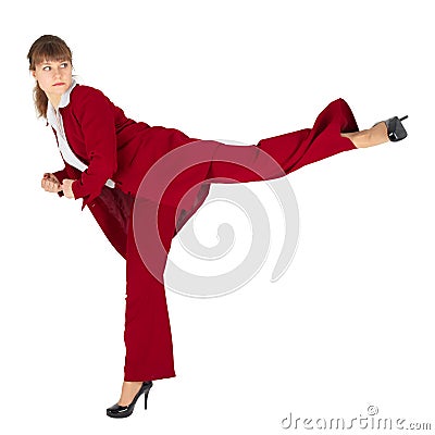 Young woman kicks back on white background Stock Photo