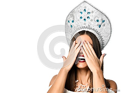Young woman covering her eyes with her hands Stock Photo