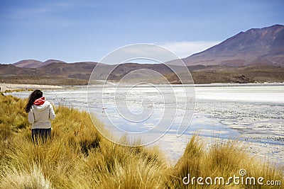 Young woman at Laguna Hedionda in Bolivia Stock Photo