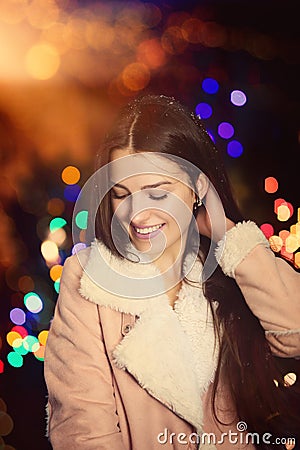 Young woman laughs on a winter Stock Photo