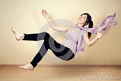 Young woman levitating Stock Photo