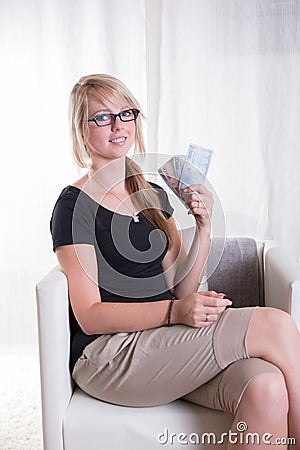 Young woman likes receiving Euros Stock Photo