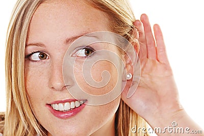 Young woman listening to the Stock Photo